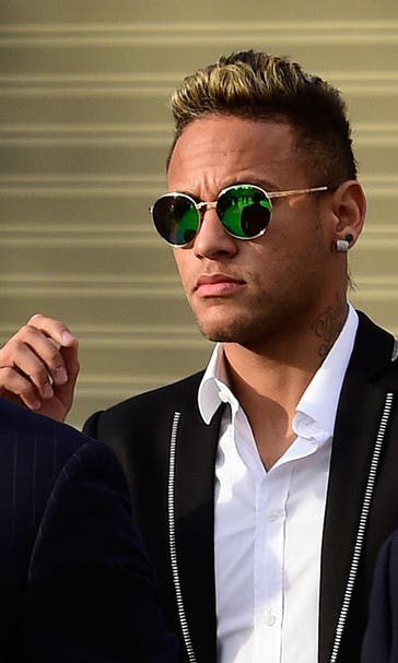 Neymar maintains innocence after appearing in Madrid court